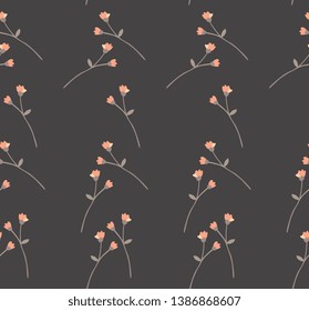 Simple floral pattern with tiny branches with orange buds on black background. Print for fabric.