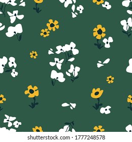 Simple floral print on green background. Seamless floral print. Vintage textile collection. Template for scarves, dresses, swimwear.