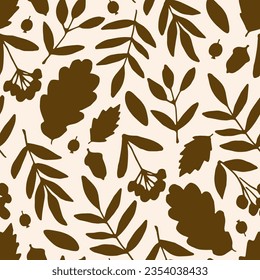 Simple floral vector seamless pattern. Dry brown autumn leaves, branches on a light beige background. For prints of fabrics, textiles, packaging.