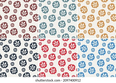 Simple flower multi color geometric repeat pattern.