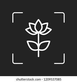 Simple flower symbol. Linear icon. White object in camera autofocus on dark background