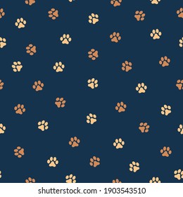 Simple footprints pattern. cute animal tracks. dark blue background. Vector texture. Fashionable print for textiles and wallpaper.