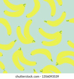 Simple fruit pattern. Green background, bright ripe bananas. The print is well suited for banner, postcard,Wallpaper,textiles and packaging.