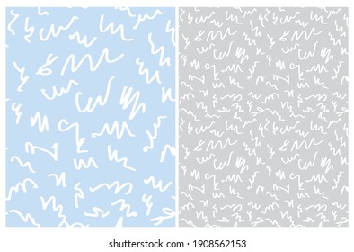 Simple Geoetric Seamless Vector Patterns. White Hand Drawn Irregular Daubs Isolated on a Pastel Blue and Light Gray Background. Abstract Doodle Print. Freehand Scribbles Repeateable Desing.