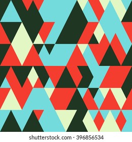 Simple geometric background with triangles of red, blue and green. Seamless pattern in flat style. Vector illustrations. Modern background. Can be used as backdrop for web.