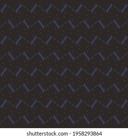 Simple geometric ornament with blue zigzags and flecks, on a black plane. Fashion pattern.