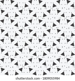 Simple geometric ornament consisting of triangles and dots. Ceramic tile pattern. Artwork in black and white.