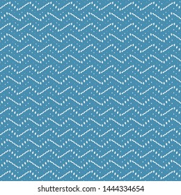 Simple geometric pattern with dots and zigzags on blue background. Decorative background. Ethnic. Textile. Paper. Vector illustration.