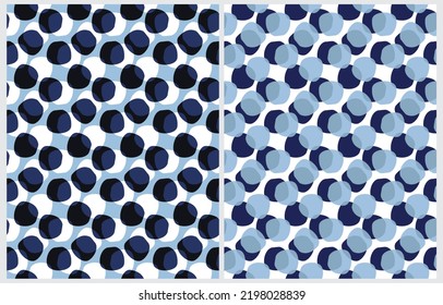 Simple Geometric Seamless Vector Patterns with Hand Drawn Irregular Black and Blue Dots on a White and Blue Background. Dotted Print Ideal for Fabric, Textile, Wrapping Paper. Polka Dots Design.