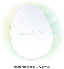 Simple green Easter background with egg on a pale blurry back. Good for postcard design.