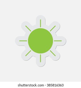 simple green icon with contour and shadow - sun on a white background