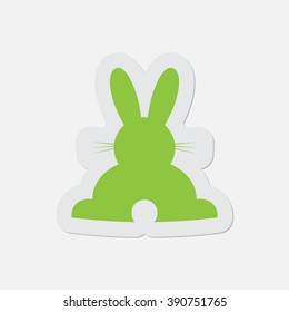 simple green icon with contour and shadow - back Easter bunny on a white background