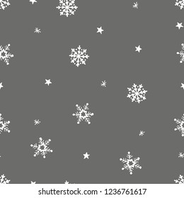 Simple grey festive seamless pattern with hand drawn white snowflakes. Christmas winter design. With falling snow. Vector illustration background.