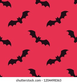Simple Halloween pattern of black bats on red background