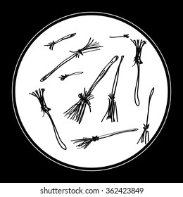 Simple hand drawn doodle of some broomsticks