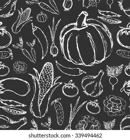 simple hand drawn doodle vegetables on black board seamless pattern