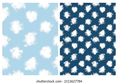 Simple Hand Drawn Dotted Vector Patterns.White Brush Dots made of Irregular Spots on a Light Blue and Navy Blue Background. Infantile Style Abstract Geometric Vector Print Ideal for Fabric, Textile.