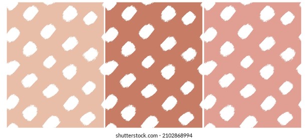Simple Hand Drawn Irregular Dotted Vector Patterns. White Brush Dots Isolated on a Various Coral Red Backgrounds. Infantile Style Abstract Geometric Print with Spots Ideal for Fabric, Textile.