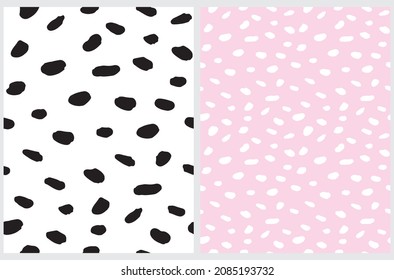 Simple Hand Drawn Irregular Geometric Seamless Vector Patterns. Black and White Spots on a Pastel Pink and White Background. Cute Infantile Repeatable Design. 