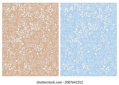 Simple Hand Drawn Irregular Geometric Seamless Vector Patterns. White Spots and Daubs on a Pastel Blue and Light Brown Background. Cute Infantile Repeatable Design ideal for Fabric, Textile.