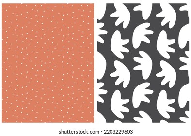 Simple Hand Drawn Irregular Spots Seamless Vector Patterns. White Dots and Irregular Shape Stains on a Terra cotta Red and Pale Black Background. Infantile Style Abstract Dotted Vector Print.