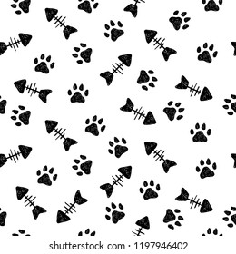 Simple hand drawn vector pattern with cat paws and fish skeleton