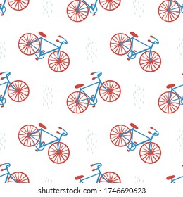 Simple hand drawn vector pattern. Red and blue bicycles isolated on white background. Light blue brushstrokes. Cute transport illustration. Road trip. Perfect for wallpaper or fabric.