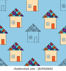 Simple hand-drawn vector seamless pattern for kids design. Cute little colored houses on a blue background. For prints of fabric, wallpaper, clothing, textile products, home decor.