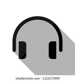 Simple headphones icon. Black object with long shadow on white background