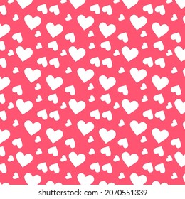 Simple hearts seamless vector pattern. Valentines day background. Design endless chaotic texture made of heart silhouettes.