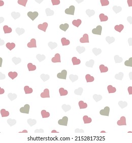 Simple hearts seamless vector pattern. Valentines day background. Flat design endless chaotic texture made of tiny heart silhouettes. Shades of red.