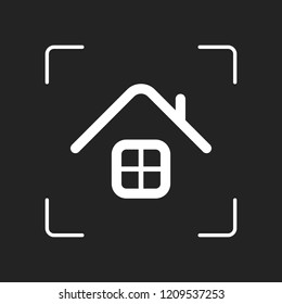 Simple house icon. White object in camera autofocus on dark background
