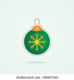 Simple icon of green bauble with snowflake.