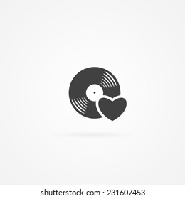 Simple icon of heart and vinyl record. White background and shadow.