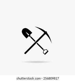 Simple icon shovel with a pick-axe.