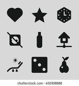 Simple icons set. set of 9 simple filled icons such as bottle, sunbed, hearts, dice, pear, home, wall clock, star
