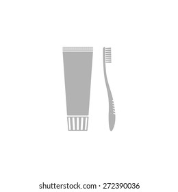 Simple Image toothbrush and a tube of toothpaste.