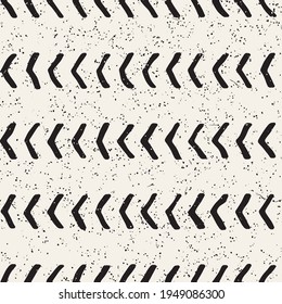 Simple ink geometric pattern. Monochrome black and white repeating arrow lines background. Hand drawn ink brushed texture design.