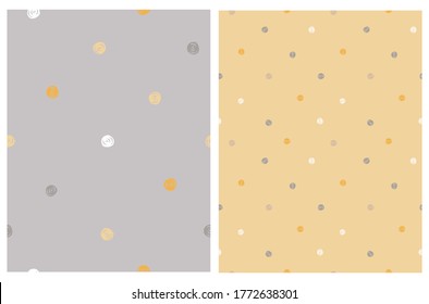 Simple Irregular Dotted Vector Patterns. Yellow, White and Gray Hand Drawn Spots on a Gray Background.White, Gray and Orange Little Daubs on a Pastel Yellow. Abstract Minimalist Geometric Print.