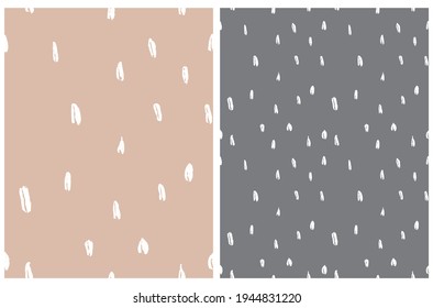 Simple Irregular Geometric Seamless Vector Patterns. White Hand Drawn Spots Isolated on a Light Brown and Dark Gray Background. Cute Spotted Layout ideal for Fabric, Textile. Abstract Doodle Print.