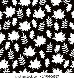 Simple leaf pattern. Black background, different white leaves . Autumn. The print is well suited for textiles, banners, Wallpapers and packaging.