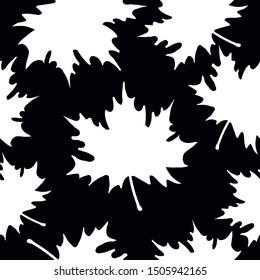 Simple leaf pattern. Black background, big white maple leaves . Print is well suited for textiles, Wallpaper, banners and packaging.