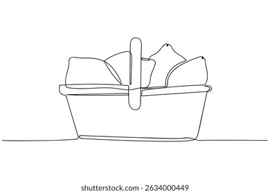 Simple line art depicting a basket filled with pillows in a minimalistic style