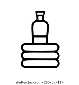 Eine einfache Linie Zeichnung Silhouette einer Flasche auf einem Stapel von drei gefalteten Handtüchern ruht.