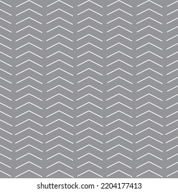 Línea ondulada blanca sobre el fondo gris Adecuada para rayas de tela. Papel envuelto. Línea triangular.