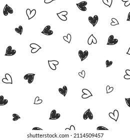 Simple little hearts. Hand drawn black line seamless pattern on white background. Doodle brush, pen, marker illustration. Scribble ornament backdrop.