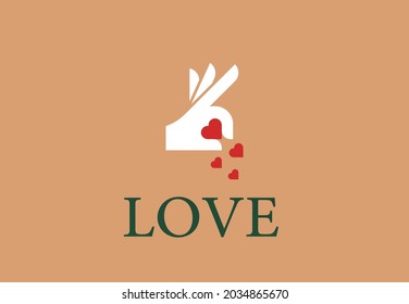 Simple logo with red hand gesturing OK and falling hearts 
