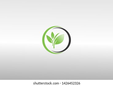 Simple logo round shape green leaves