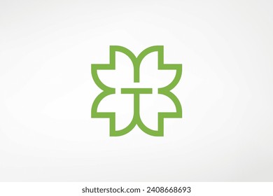 Un sencillo logotipo que combina las letras T y las flores. Impresionante natural, adecuado para cosméticos y otras empresas.