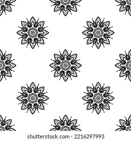 Simple mandala Black and white Seamless Pattern. Hand-drawn background. Islam, Arabic, Indian, and ottoman motifs. Perfect for printing on fabric or paper.